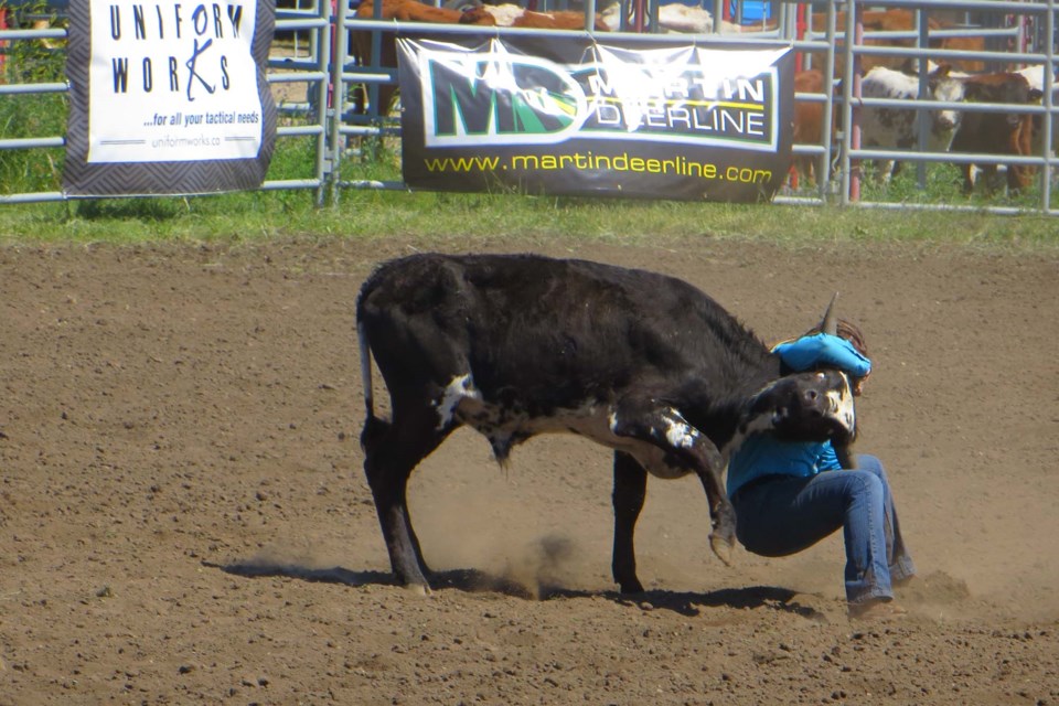 The First Responders Rodeo held at Kinsmen Korral on Saturday, July 16 had lots of surprises including a steer that refused to flip over during the Steer Wrestling competition. ANNA BOROWIECKI/St. Albert Gazette