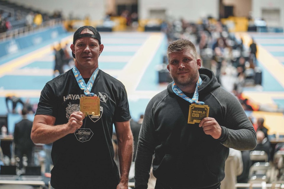 Luke Harris (left) and AJ Timm (right) pose with their medals at the 2021 No-Gi World Championships in Texas. Harris took home a gold and silver medal while Timm captured bronze in the brown-belt ultra-heavyweight division. SUPPLIED/Photo