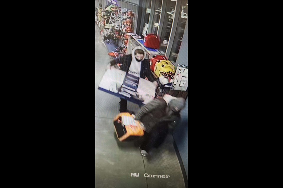 Two suspects took a lawnmower and a generator from a Morinville business on Dec. 18, 2021. SUPPLIED/Photo