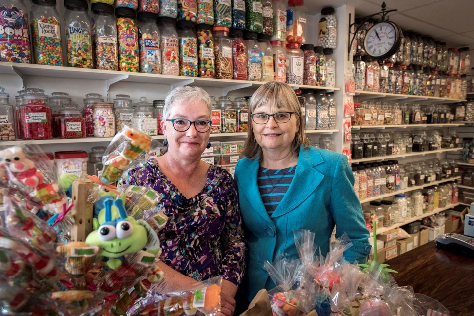 Candy Bouquet owners Gisele Sinclair, left, and Kathie Fisher, inside their store on Friday, July 19, have decided to retire and put their business up for sale. DAN RIEDLHUBER/St. Albert Gazette