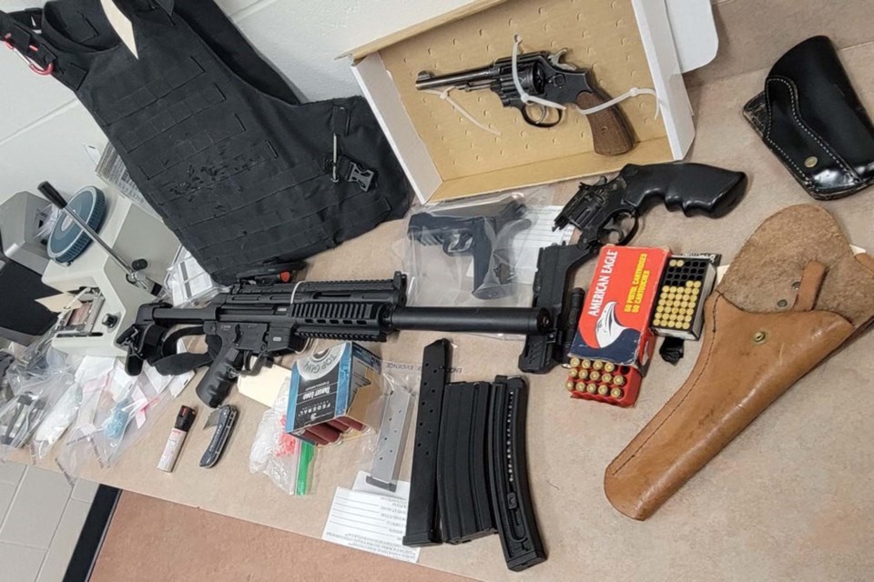 Police found a 9mm handgun; 22 caibre rifle; ammunition and magazines among other items on Nov. 18 at a St. Albert home. SUPPLIED/Photo