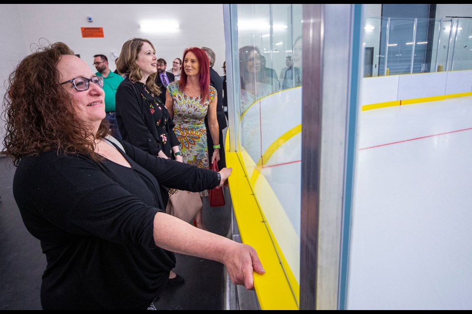 Morinville dignitaries and guests, including former mayor Lisa Holmes (back centre), take in the sights of the newly opened Morinville Leisure Centre on Monday. CHRIS COLBOURNE/St. Albert Gazette