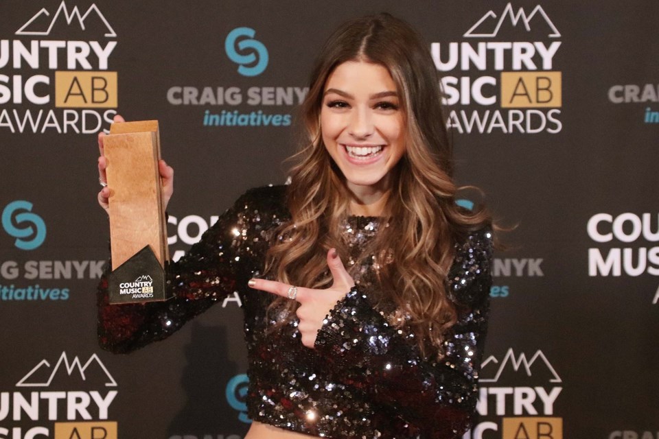 Hailey Benedict flashes her happy smile after receiving the Horizon Female Artist of Year and  Horizon Single of the Year at the 11th annual Country Music Alberta Award ceremonies. BILL BORGWARDT/Photo