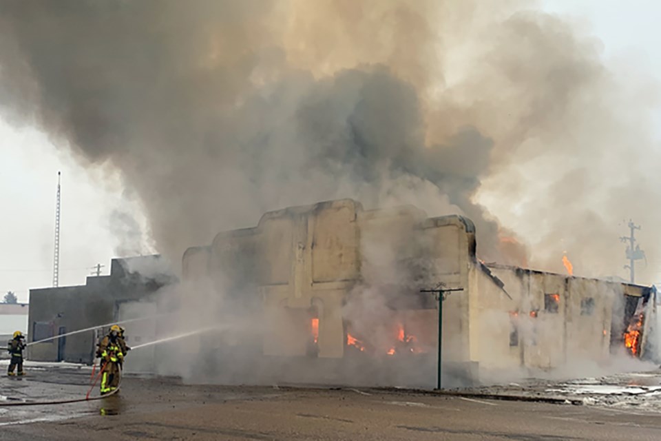 Westlock fire crews were called to a structure fire on 107 Street at 6:43 a.m. on Thursday, Nov. 14 and were on the scene throughout the day. The century-old building was being used as a storage warehouse for furniture and appliances, all of which were lost in the blaze. GEORGE BLAIS/WN photo