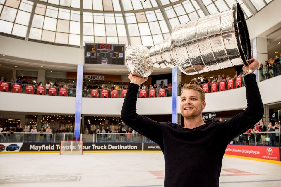 Colton Parayko of St. Albert hoists the Stanley Cup at centre ice of the Ice Palace in West Edmonton Mall during a break in action at the Brick Invitational Hockey Tournament on Wednesday,  July 3, 2019. Photo by Dan Riedlhuber / St. Albert Gazette

 