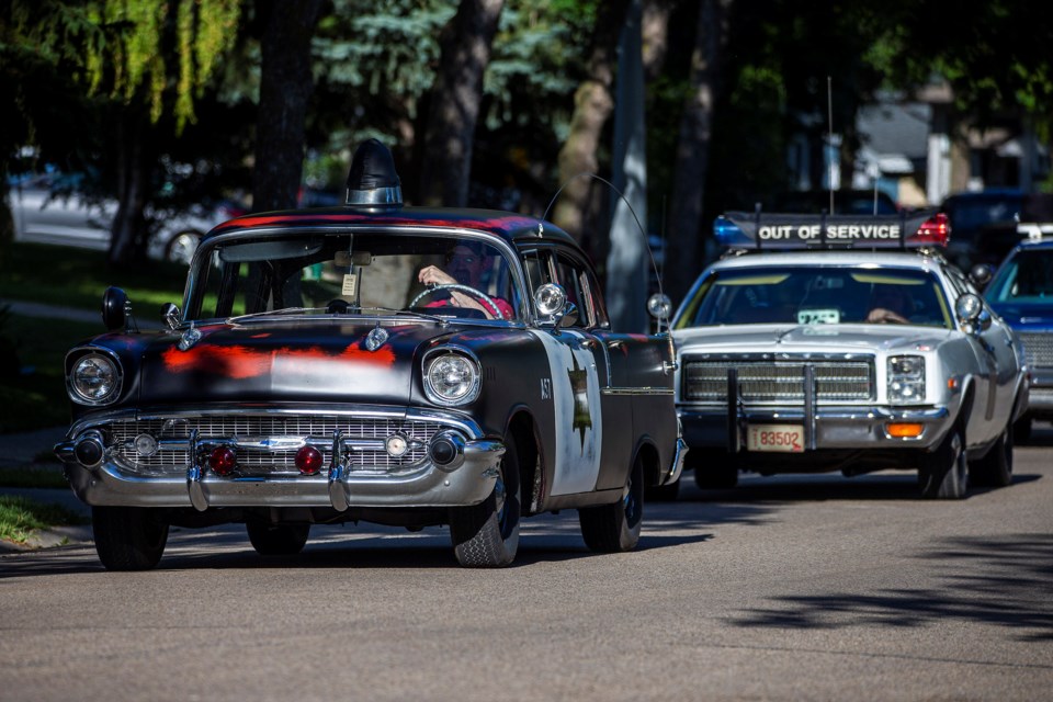 A large contingent of classic police vehicles led the way during the East Side Cruise event. CHRIS COLBOURNE/St. Albert Gazette