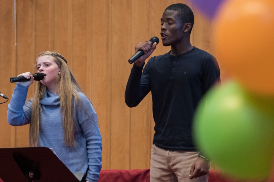 Sofiya Chovjka and Marc Melisizwe of the Melisizwe Brothers Band rehearse for a fundraising event at the United Church in St. Albert on Tuesday, Sept. 24, 2019. JOHN LUCAS/St. Albert Gazette