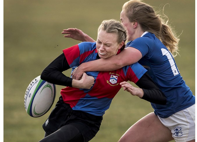 IMPACTED – Keely Mazzolini-Flynn loses the ball as Heidi Farley of the Edmonton Pirates makes the tackle but not before the St. Albert Rugby Football Club player used her speed on the wing to cross the line for a try in the Alberta premier women’s division lid-lifter Thursday. The Pirates won 29-22 at SARFC. The halftime score was 22-15 for SARFC. Both teams were semifinalists last year.
DAN RIEDLHUBER/St. Albert Gazette