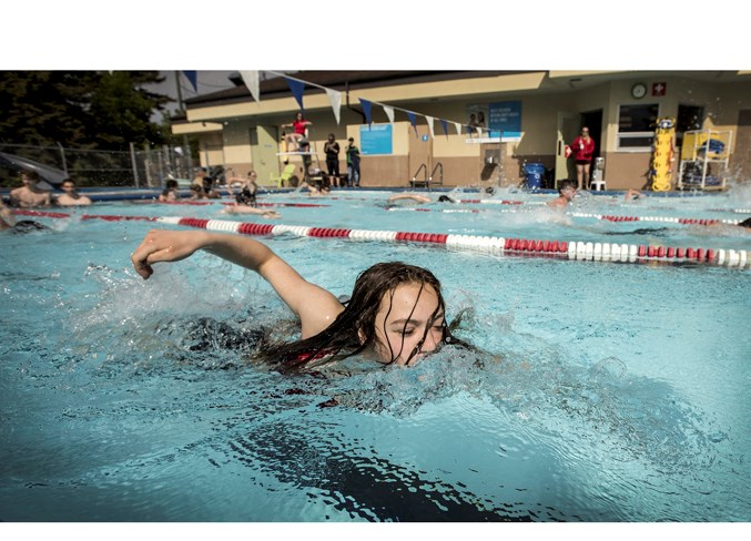 TRI TIME – Grade 9 student Sarah Dykstra swims in lane one at Grosvenor pool during the 28th-annual Sir George Simpson Triathlon. Wednesday's race featured 160 students swimming between 100 and 150 metres depending on the grade level, biked about 1.2 kilometres and ran about 1.2 km. There were 35 volunteers/marshals providing assistance.
DAN RIEDLHUBER/St. Albert Gazette