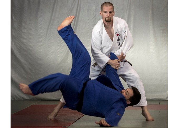 NATIONAL CHAMPION – Kyle Crowell of Morinville, a St. Albert Judo Club instructor and the veteran group one (30 to 35) minus-81 kilogram champion at the 2019 Canadian Open Judo Championships, throws club member Jerry Simundza, a bronze medallist in the plus-100 kg. division, at Monday's training session.
DAN RIEDLHUBER/St. Albert Gazette