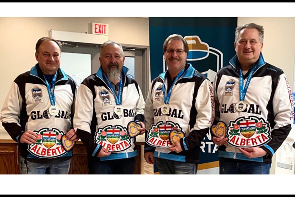 FANTASTIC FOUR - Skip Wade White, third Barry Chwedoruk, Dan Holowaychuk and lead George White. The Team Alberta players are the 2021 senior national champs.    File Photo/ supplied