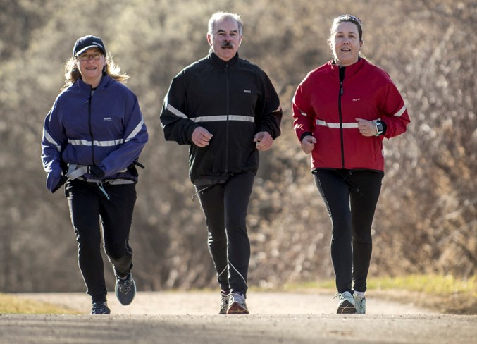 FAST FORWARD – Maggie Martin, left, Gerry Cameron and Gail Firth of St. Albert run along the Red Willow Trail near Mission last weekend. Runners are out in full force in preparation for various racing events like the St. Albert Road Race, presented by Active Physio Works on Sunday and featuring the 34th annual 10-miler, and the ninth annual Leading Edge Physiotherapy RunWild on May 5. 
DAN RIEDLHUBER/St. Albert Gazette
