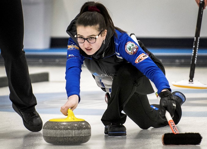 BRINGING IT – Julia Bakos of St. Albert delivers skip rock for the Crestwood rink of third Quinn Prodaniuk, second Kim Bonneau, lead Julianna MacKenzie and coach Blair Lenton as the Alberta host team in the women’s draw at the Curling Canada Optimist U18 championships underway at Glen Allan Recreation Complex in Sherwood Park. The men's draw at nationals features the U18 provincial championship rink of St. Albert skip Nathan Molberg, third Ben Helston, second Nick Warkman, lead Morgan Bilassy and coach Nicole Bellamy. Visit www.curling.ca for schedules and results at nationals.
DAN RIEDLHUBER/St. Albert Gazette