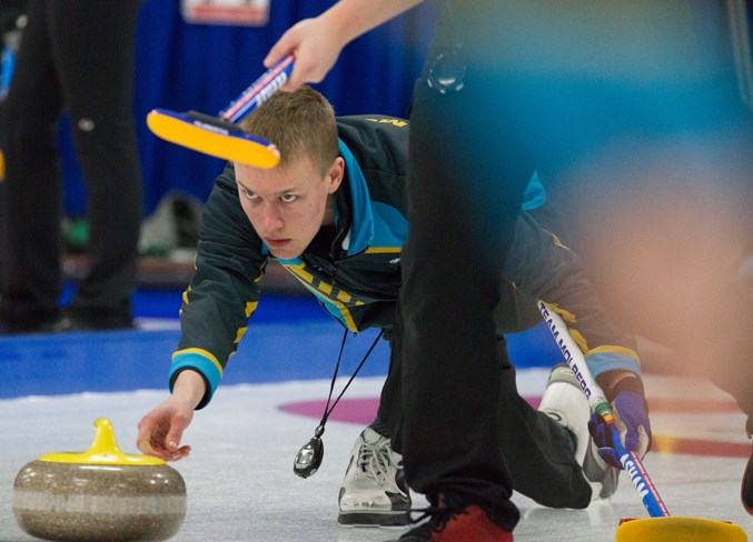 DELIVERER – St. Albert skip Nathan Molberg releases a rock for the U18 Alberta team at the Canada Winter Games in Red Deer. Molberg, third Ben Helston, second Nicholas Warkman, lead Morgan Bilassy and coach Nicole Bellamy finished the round robin tied for third at 7-3 with Newfoundland and Labrador and in the opening playoff round lost 4-3 to Manitoba. The Molberg foursome are ranked No. 1 in the eight-team Curling Alberta U18 Optimist juvenile men’s championship starting Thursday in Medicine Hat.  