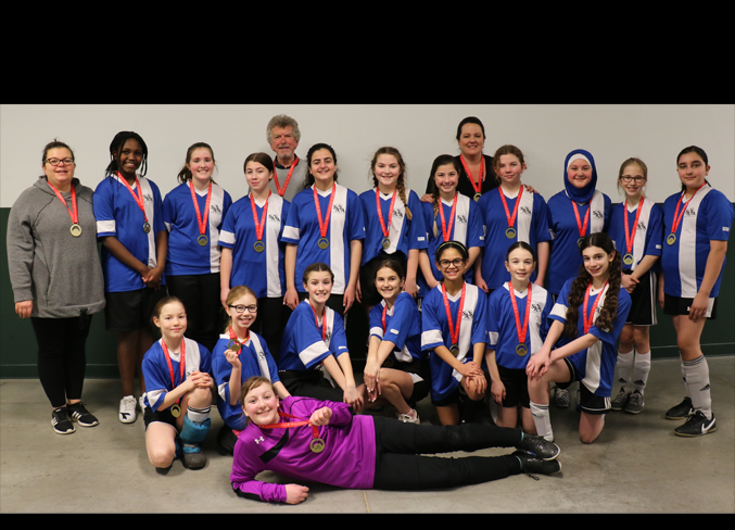 CHAMPIONS – The U13 St. Albert Frostbites female community indoor soccer team placed first overall in the four team round-robin playoff in the Edmonton Minor Soccer Association championships after placing second in its division at 8-2-3 in league play. The playoff scores were 1-0 against Willowby, 1-1 against Greenfield and 2-0 against St. Albert Chalupa. The Frostbites qualified for the playoffs by winning its last league game 5-0 to finish behind Willowby in the division standings.