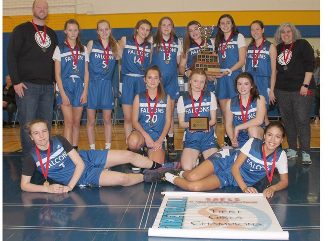 THREE-PEAT – The third-straight St. Albert Physical Education Council junior high basketball championship for the Richard S. Fowler Falcons in four consecutive trips to the Tier I city final was Tuesday’s 73-49 victory against the Vincent J. Maloney Marauders at the SkyDome. Fowler finished 11-0 in league play and 22-0 overall as winners of four tournaments after going 19-0 in 2018 and 19-3 in 2017. This year’s roster of 10 Grade 9s, including four third-year players, and two Grade 8s features six returnees from last year. Fowler also defeated VJM 60-43 in the 2018 final and 47-39 in the 2017 final. This year’s undefeated record for Fowler consisted of five wins against VJM: two in league and the tournament finals of the VJM pre-season opener, Boston Pizza Invitational, hosted by SAPEC, and the Fowler Classic. Fowler also beat VJM six times last season. 
JEFF HANSEN/St. Albert Gazette