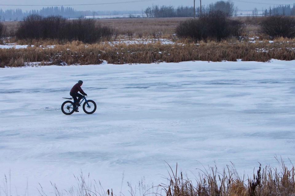 stand alone bike on river CC 7781 CC
