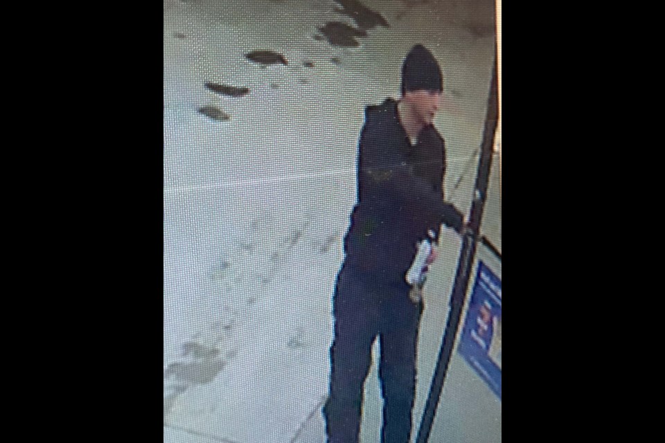 The first suspect is described as a Caucasian male of average build, wearing a black toque, black pants, and a black hoodie. SUPPLIED/Photo