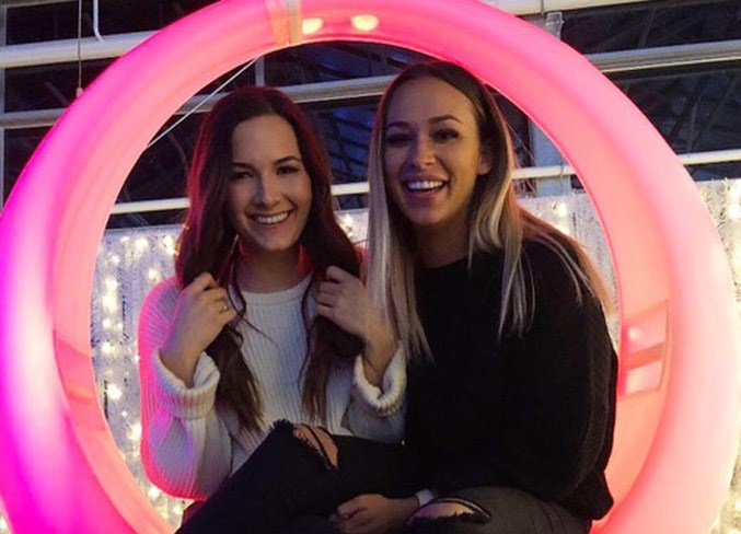 Singer-songwriter Lia Cole, left, shares a moment of Joy with her best friend Taya Martin at St. Albert's Christmas Glow Festival. Cole’s latest song, For You, is dedicated to Martin, 20, who died by suicide in early January.