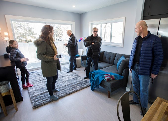 The Tuttle family held an open house and tour of their newly built garage suite in St. Albert.