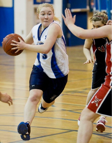 Melissa Woolley of the Paul Kane Blues drives to the hoop against the Salisbury Sabres in Wednesday&#8217;s metro Edmonton premier women&#8217;s match at Paul Kane High