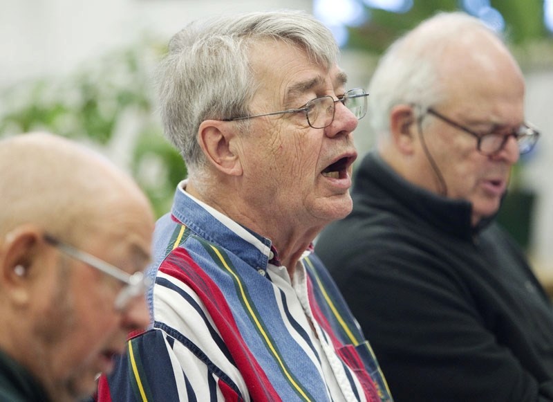 Al Eshpeter sings with members of the Swiss Men&#8217;s Choir