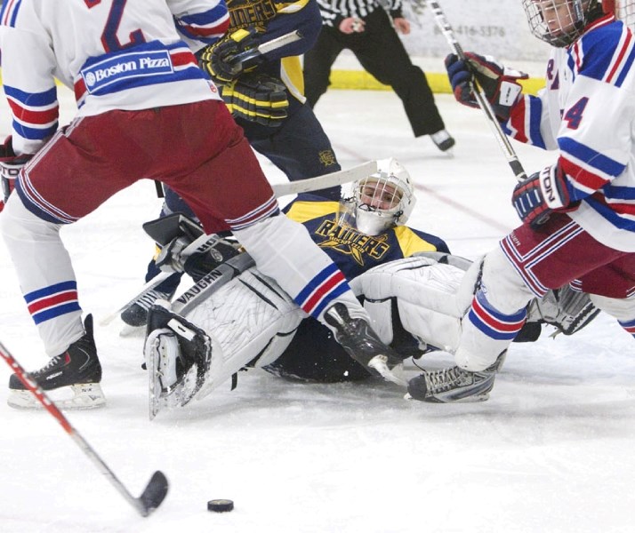 A sprawling Wyatt Hoflin watches the puck slide past the St. Albert Raiders&#8217; net in Sunday&#8217;s midget AAA game against the Fort Saskatchewan Rangers at Akinsdale