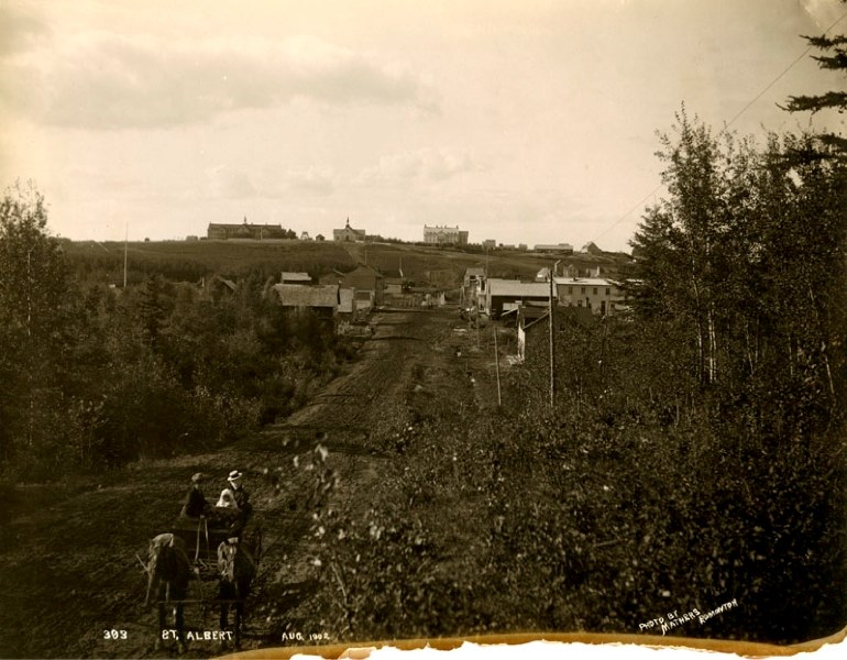 A view of what is now Perron Street in St. Albert as seen in 1902. The Father Lacombe Chapel and St. Albert Parish can be seen in the distance atop Mission Hill.