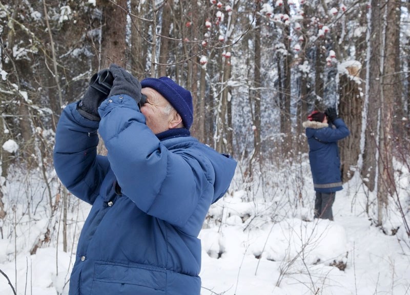 Peter Demulder (left) and Percy Zalasky look for birds of all shapes and sizes during the 20th annual Christmas bird count. Bird counters recorded 7