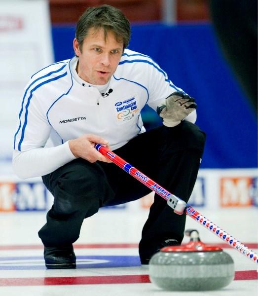 Olympic silver medallist Thomas Ulsrud holds his sweepers off during action at the World Financial Group Continental Cup of Curling at Servus Credit Union Place. Ulsrud