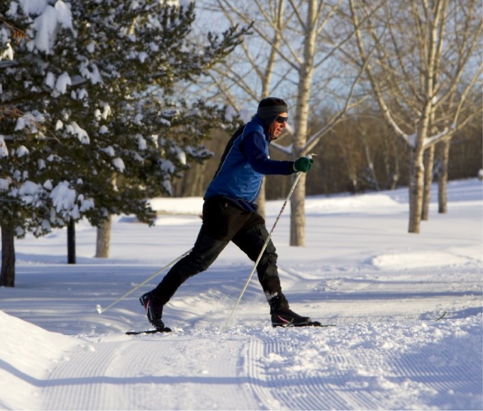 John Slapman enjoys some morning exercise on newly groomed ski trails in the Kingswood area Tuesday. New studies released by Statistics Canada this week suggest Canadians