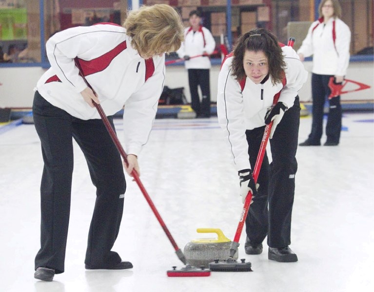 Nyla Kurylowich (right) and coach Diana Backer of St. Albert are going to the 17th annual Winter Deaflympics in Slovakia with the Judy Robertson rink. The Robertson foursome