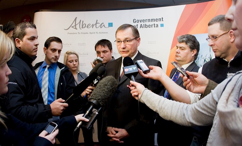 Premier Ed Stelmach addresses reporters after announcing a new bitumen upgrading deal Wednesday morning.