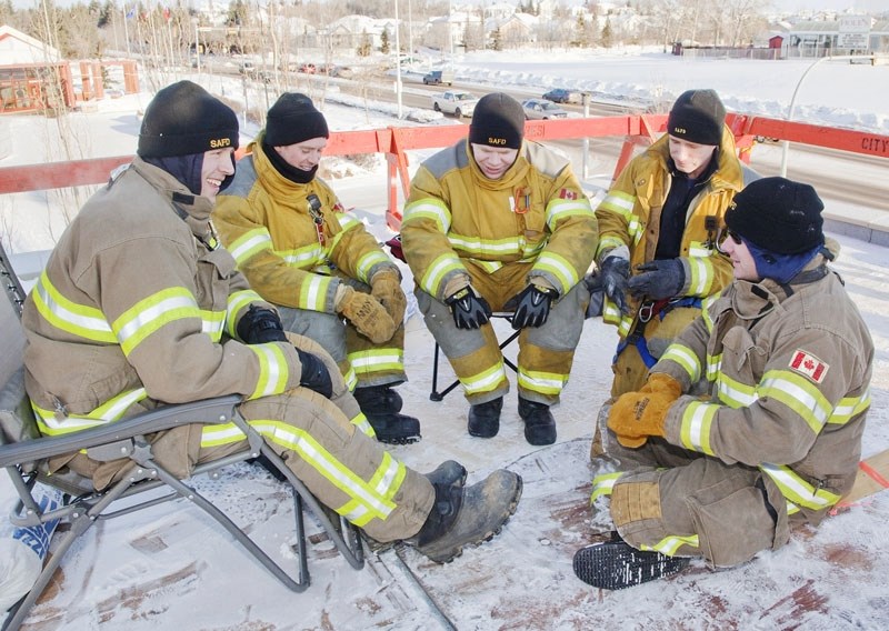 (L-R) St. Albert firefighters Peter McDougal