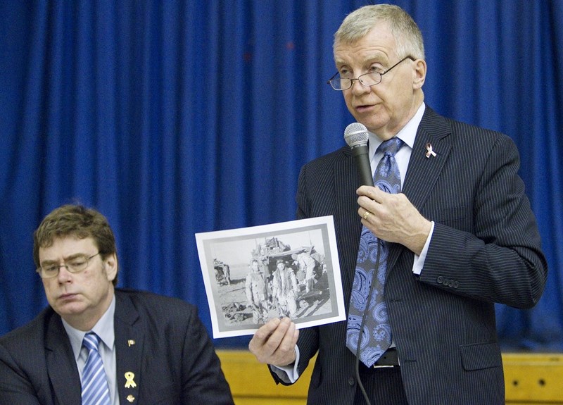 Edmonton-St. Albert MP Brent Rathgeber (left) and Edmonton-Centre MP Laurie Hawn address a crowd of about 30 for a town hall meeting on the war in Afghanistan.