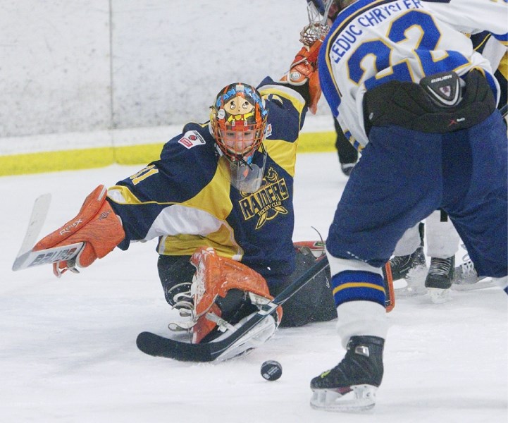 St. Albert Raiders netminder Tanner Kovacs (31) keeps his eye on a rolling puck against the visiting Leduc Oil Kings in Wednesday&#8217;s north division semifinal. The