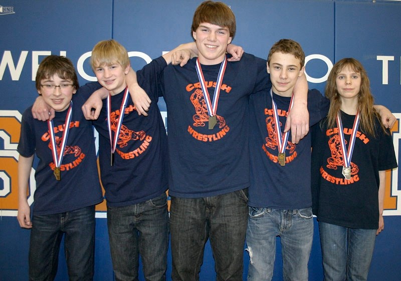 Lorne Akins Crush wrestlers (L-R) Connor Beuerlein