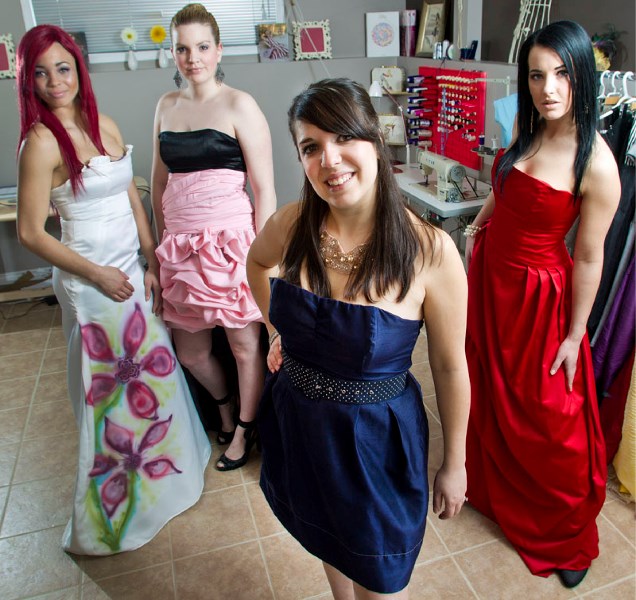 Fashion designer Lisa-Marie Sciroli (centre) has models (L-R) Jacquelyn Phillips