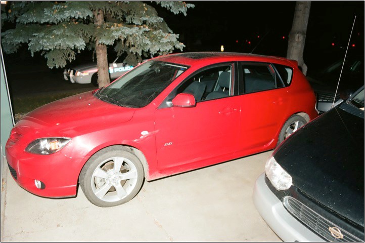 Johnny Altinger&#8217;s red 2005 Mazda 3 was recovered by police at the home of Joss Hnatiuk