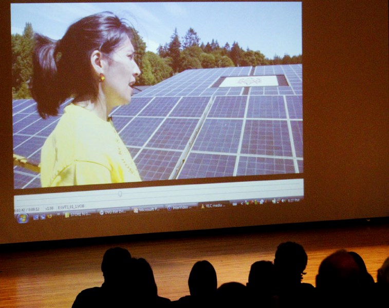 An audience at Grant MacEwan University&#8217;s CN Theatre watch a video as part of the Solar Energy Society of Alberta&#8217;s presentation from Chief Gordon Planes of the