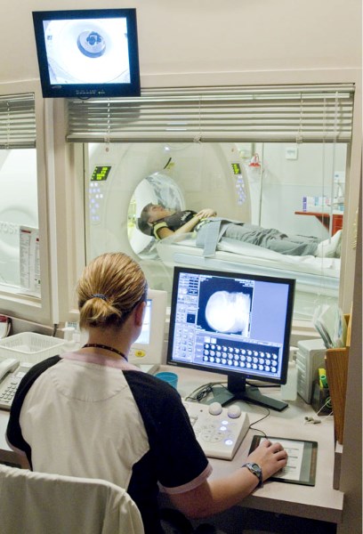 CT technologist Shauna Keenan demonstrates the new mobile CT unit at the Sturgeon Community Hospital Monday. The new unit