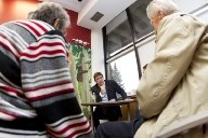 Conservative candidate Brent Rathgeber holds court while &#8216;speed-dating&#8217; with residents during a unique election forum hosted by the St. Albert Public Library on