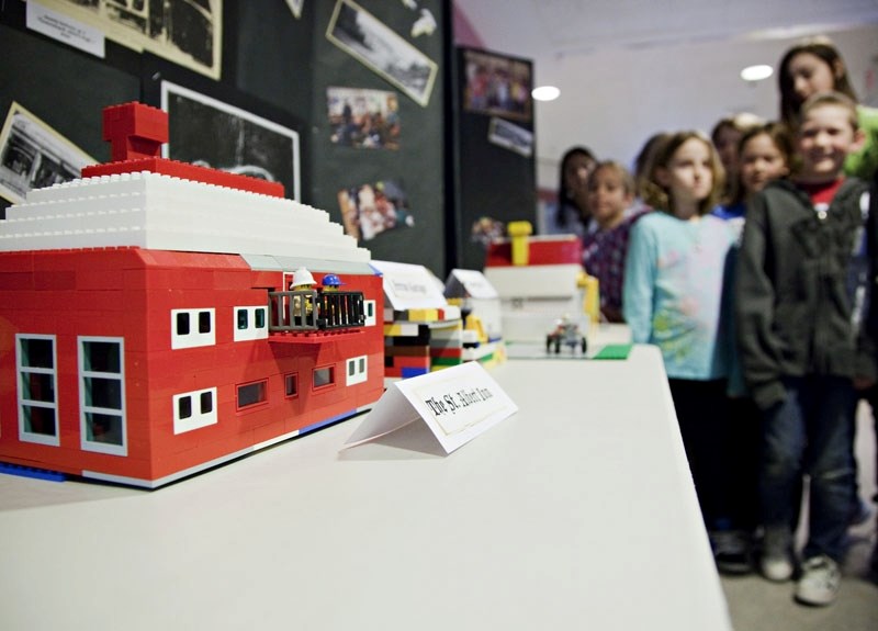 Students at Muriel Martin school check out some of the Lego buildings respresenting the Perron District of St. Albert&#8217;s past. Grade 4 and 5 students built the
