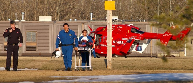 STARS air ambulance reponds to an accident involving a pedestrian and a pickup Sunday evening in Grandin. A five-year-old boy was transported to Stollery Children&#8217;s