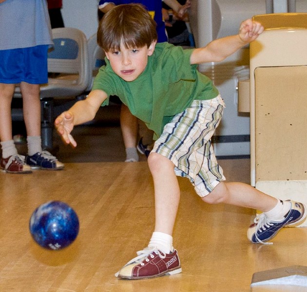 Eight-year-old Jaden Babiuk led the way at the third annual Strikes for Cancer event held at the St. Albert Bowling Centre. The youngster had the idea of raising money for