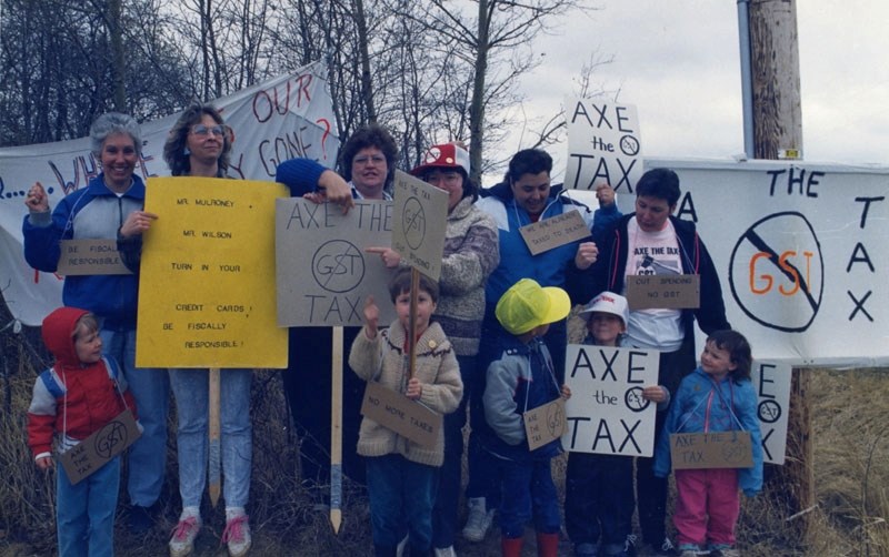 Local residents protest the Goods and Services Tax