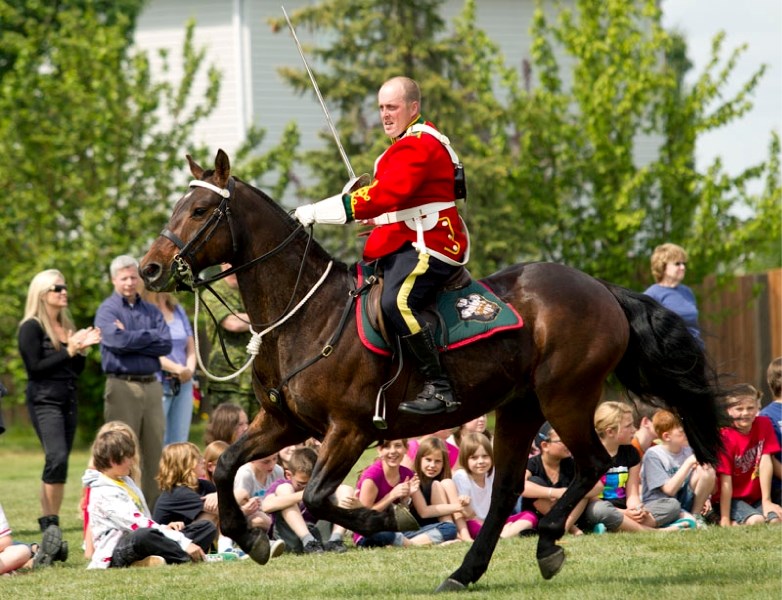A member of the Lord Strathcona&#8217;s Horse (Royal Canadians) Musical Ride demonstrates some tactics to a group of J.J. Nearing students Monday. The ride was formed in 1974 