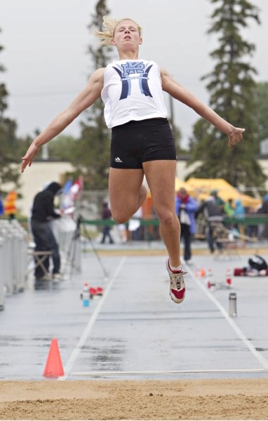 Niki Oudenaarden of the Paul Kane Blues won the Alberta Schools&#8217; Athletic Association intermediate girls&#8217; long jump with a leap of 5.24 metres in the rain Friday