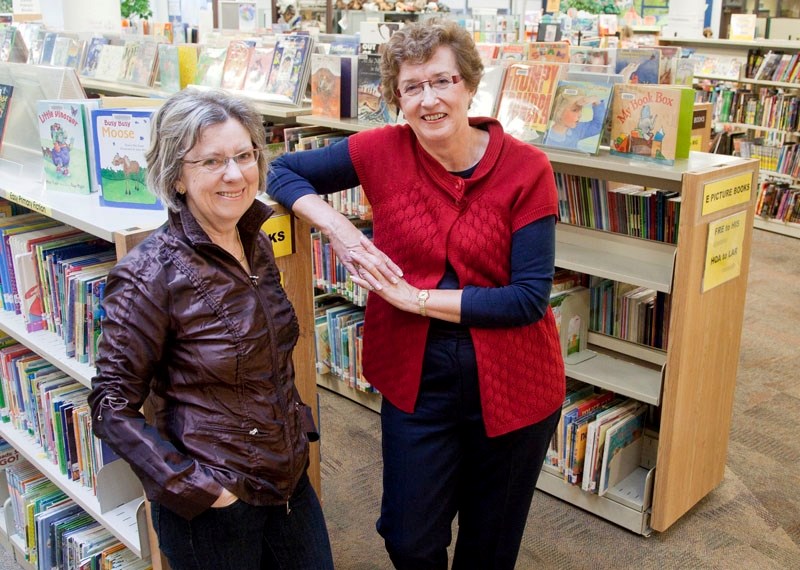 Former library director Pam Forsyth (left) and former children&#8217;s librarian Arlene Kissau worked for almost 30 years helping people young and old find the books they