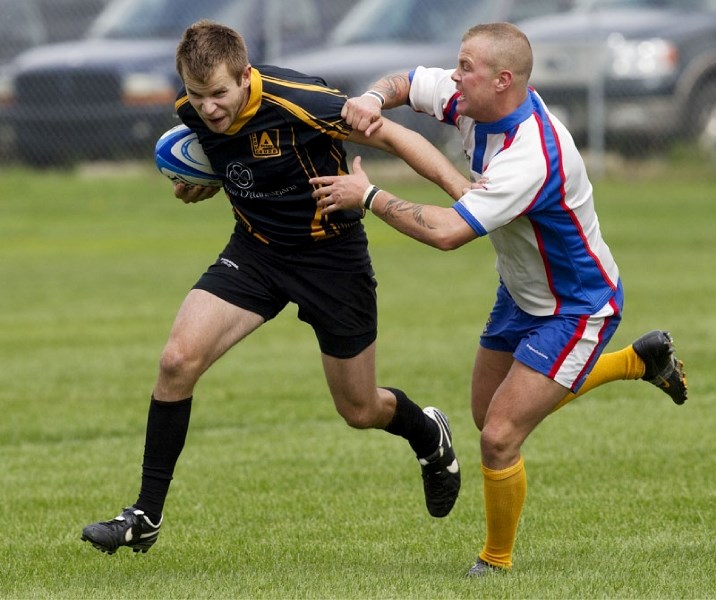 Justin (Bomber) Armitt tracks down a Leduc player in Saturday&#8217;s second division match at the St. Albert Rugby Football club. The seconds defeated the defending